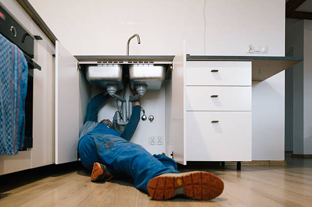 Professional Emergency Plumber technician working in Helendale, CA